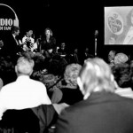 Benny Centennial 1 A full-house filled Preston Bradley Hall at the Chicago Cultural Center as Those Were The Days observed the Centennial of Jack Benny’s birth. This photo shows Chuck Schaden in conversation with special guests Joan Benny and Bobby Blumofe, Jack’;s daughter and grandson.